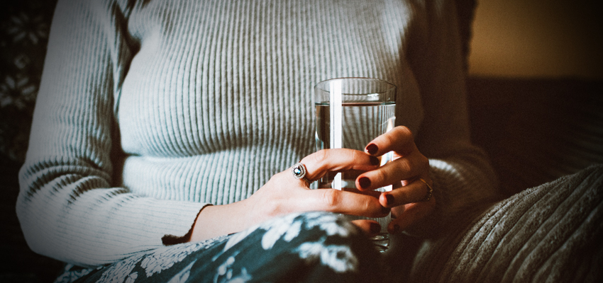 women holding a drinking glass women holding a drinking glass